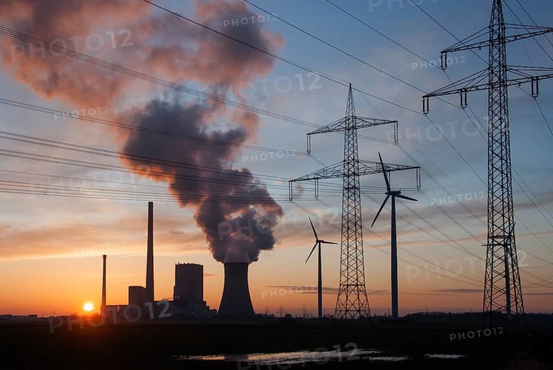 Power station, wind turbines and electricity pylons in silhouette at sunset with smoke in the sky, coal-fired power station, coal-fired power station, Mehrum, Peine district, Lower Saxony, Germany, Europe