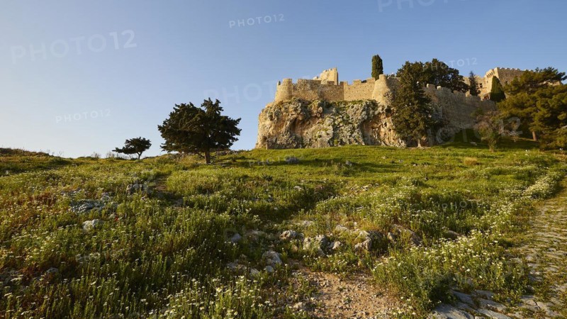 Morning light, St John's fortress, ascent to the Acropolis, Lindos, green meadows, Rhodes, Dodecanese, Greek Islands, Greece, Europe