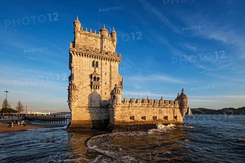 Belem Tower or Tower of St Vincent, famous tourist landmark of Lisboa and tourism attraction, on the bank of the Tagus River Tejo on sunset. Lisbon, Portugal, Europe