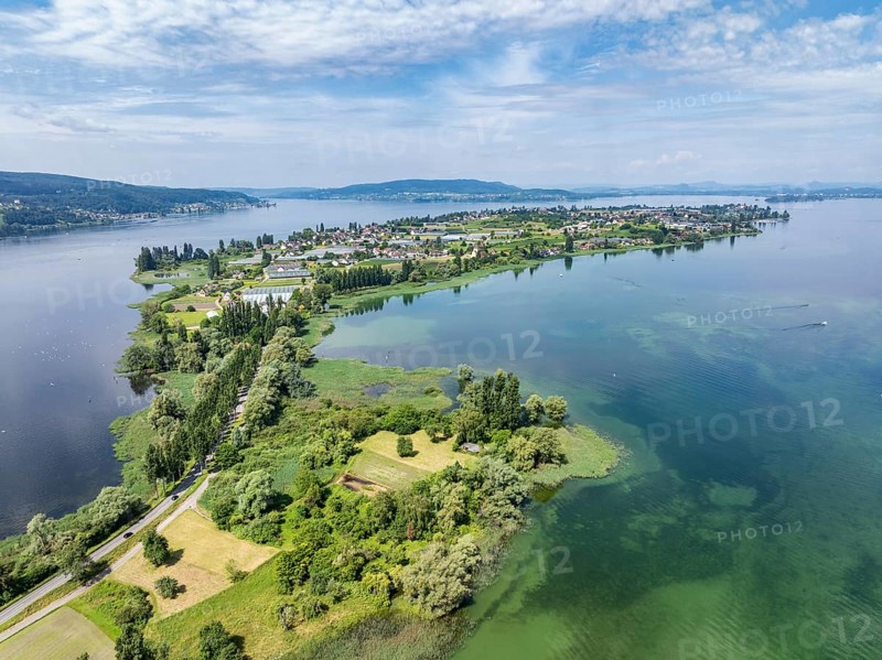 Aerial view of the island of Reichenau in Lake Constance with the Thurgau lake ridge on the horizon on the left and the Höri peninsula and the Hegau mountains next to it, district of Constance, Baden-Württemberg, Germany, Europe