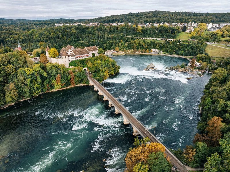 Aerial view of the Rhine Falls with railway viaduct and Laufen Castle in autumn, Neuhausen, Canton Schaffhausen, Switzerland, Europe