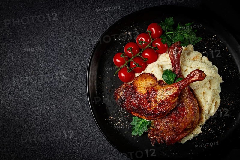 Fried duck shank, cauliflower puree, cherry tomatoes, homemade, no people