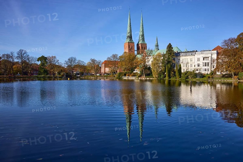Mill pond with general buildings, Lübeck Cathedral and trees, symmetrical reflections on the water surface, Hanseatic city of Lübeck, Schleswig-Holstein, Germany, Europe