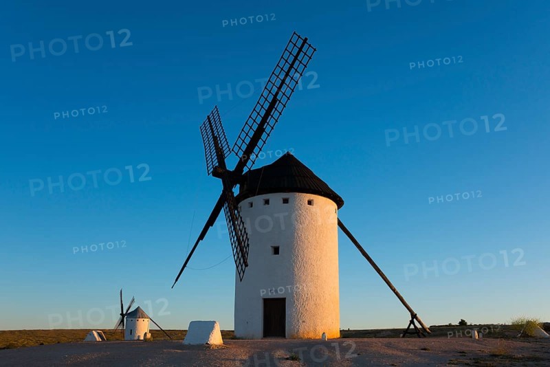 A large white windmill stands out clearly against a clear blue sky, Campo de Criptana, Ciudad Real province, Castilla-La Mancha, Don Quixote Route, Spain, Europe