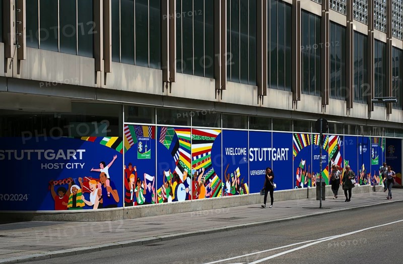 Banner, advertising and logo of the UEFA euro 2024 European Football Championship in Germany, Welcome to Stuttgart, host city, host, wheelchair, handicapped, flags, pedestrian zone, passers-by, Stuttgart, Baden-Württemberg, Germany, Europe