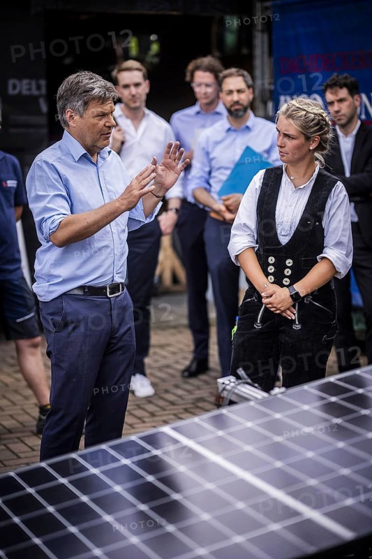 Federal Minister for Economic Affairs and Climate Protection Robert Habeck (Alliance 90/The Greens) on a summer tour of Germany. Here in Bochum, 10 July 2024, visiting a roofer with solar roof elements Photographed on behalf of the BMWK