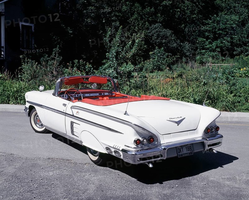 White with chrome and red trim 1958 Chevrolet Impala convertible classic automobile, Quebec, Canada, North America