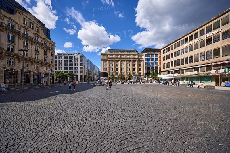 White and grey cumulus clouds with blue sky over Rathenauplatz in Frankfurt am Main, district-free city, Hesse, Germany, Europe