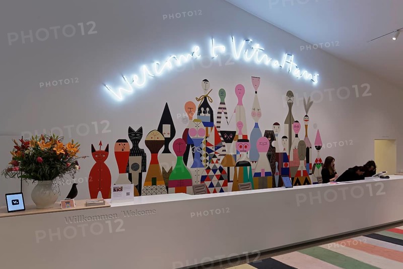 Reception desk in the Vitra Haus, mural with figures, architects Herzog & de Meuron, Vitra Campus, Weil am Rhein, Baden-Württemberg, Germany, Europe