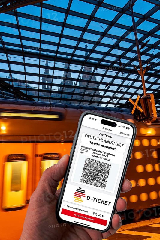Symbolic image of Deutschlandticket, new from 2025 for 58 euros per month, ticket on mobile phone app, travel on regional transport throughout Germany, for one fare with bus and train