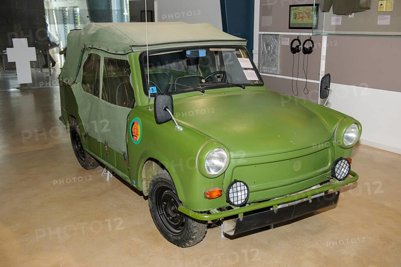 Historic vehicle of former GDR border troops Trabant 601 A Kübel, Museum Point Alpha on area of former inner-German border, in the background memorial cross on line marking course of former border strip death strip to fugitive shot while fleeing the republic, Geisa, Thuringia, Germany, Europe