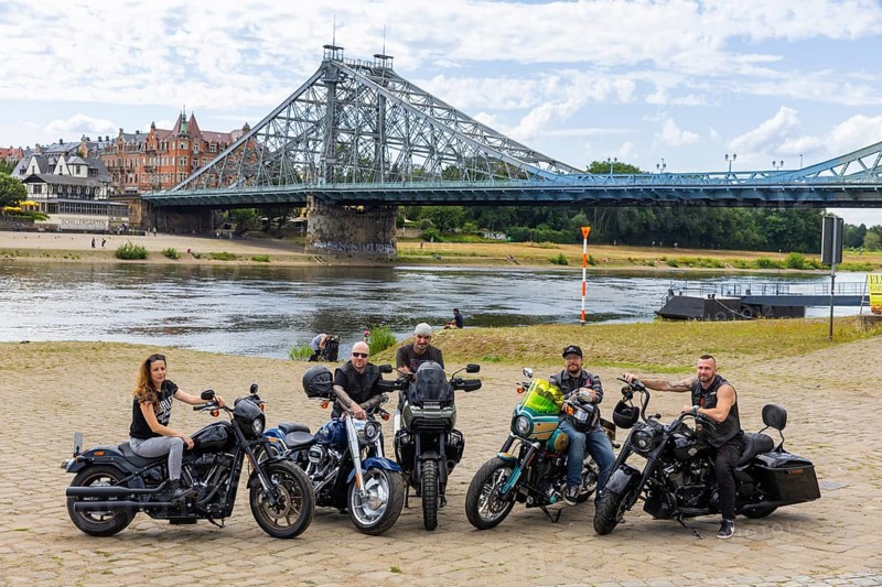 The tough guys are coming to town - view of Harley Days® Dresden 2024 chief organiser Daniela Hesse with her own bike. She is supported by several bikers, Harley Days® Dresden 2024, Dresden, Saxony, Germany, Europe