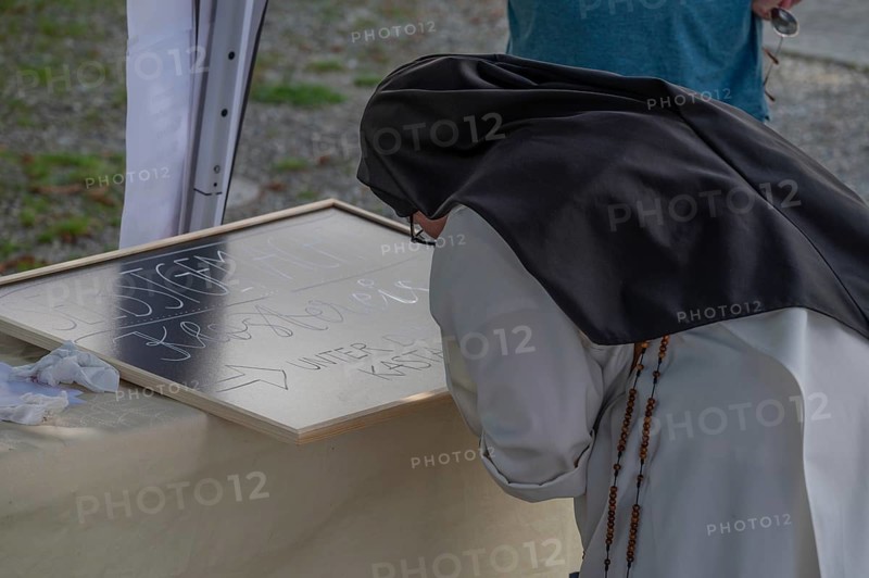 A nun from the Dominican Order writing an offering board at a monastery festival, Dominican nunnery Wettenhausen, 12th century, Wettenhausen, Kammeltal, Bavaria, Germany, Europe