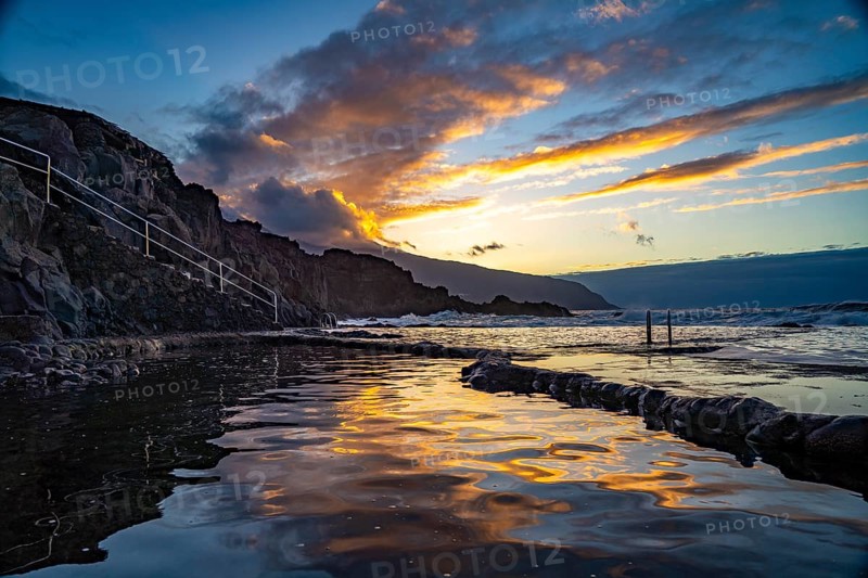 Sunset at the natural swimming pool La Maceta, El Hierro, Canary Islands, Spain, Europe