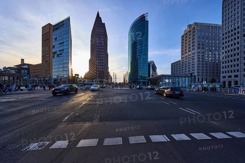 High-rise buildings Forum Tower, Kollhoff-Tower and Bahntower backlit at Potsdamer Platz in Berlin, capital city, independent city, federal state Berlin, Germany, Europe