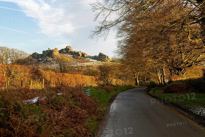 Autumn landscape of Hound Tor, road near Swallerton Gate, Dartmoor national park, north Devon, England, UK
