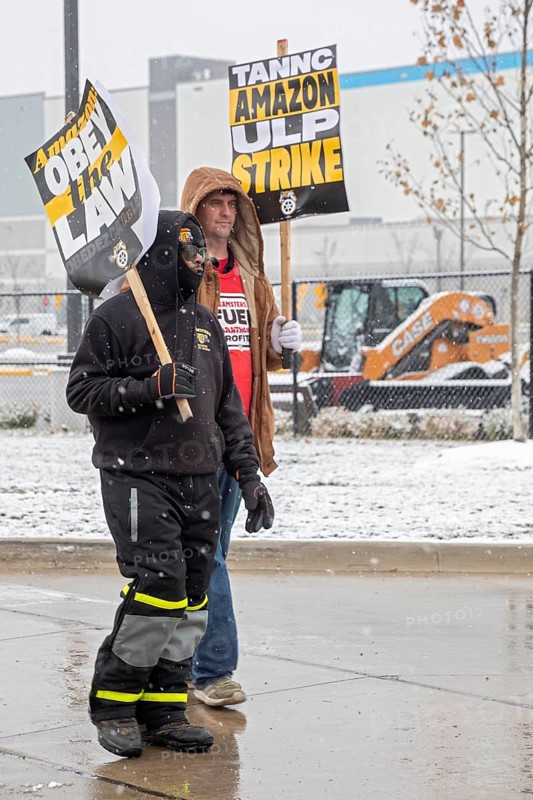 Detroit, Michigan USA - 20 December 2024 - Members of the Teamsters Union picket Amazon's Detroit fulfillment center to support unioon members striking at seven Amazon facilities around the country.