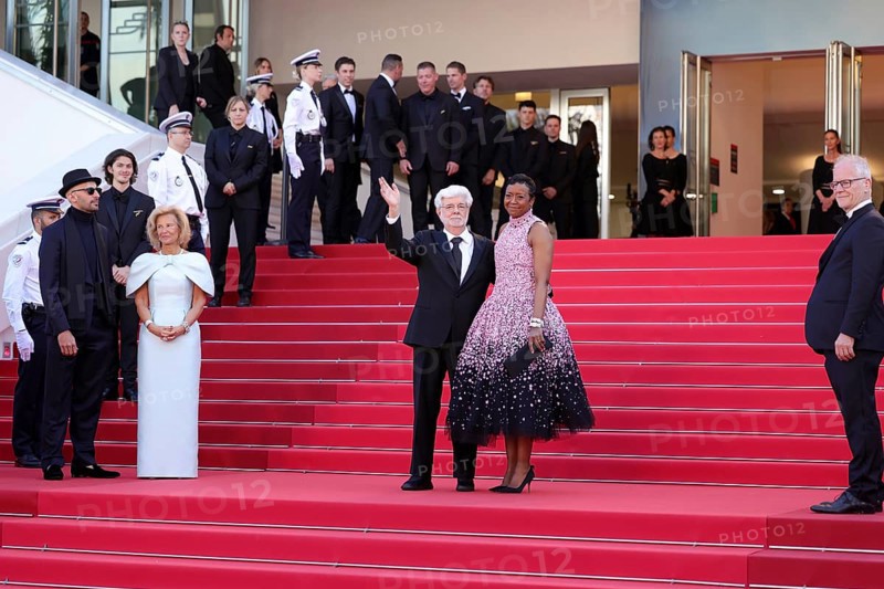 Cannes, France, 25.5.2024: George Lucas and Mellody Hobson at the closing ceremony on the red carpet of the Palais des Festivals during the 77th Cannes International Film Festival. The 77th Cannes International Film Festival will take place from 14 to 25 May 2024, Europe