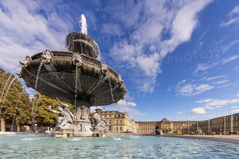 Palace square with New Palace. Fountain with fountain bowl. Place of interest in Stuttgart, Baden-Württemberg, Germany, Europe