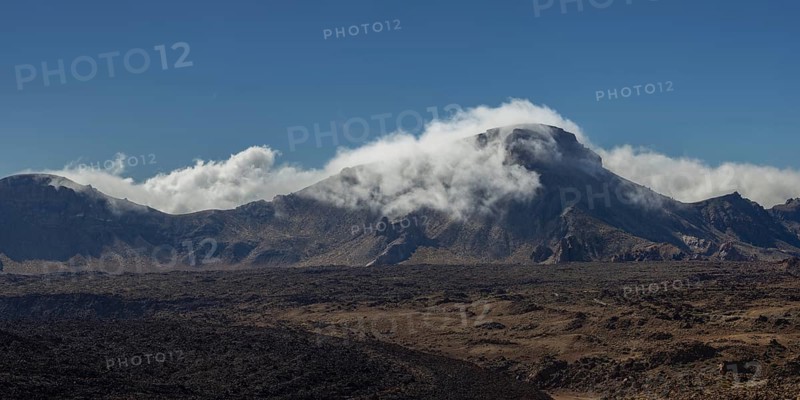 The summit of Montaña Guajara, also: Alto de Guajara, 2715m, crater walls, Caldera de las Cañadas, a huge volcanic cauldron, Teide National Park, Parque Nacional del Teide, at sunrise, Tenerife, Canary Islands, Spain, Europe