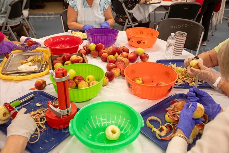 St. Clair Shores, Michigan, Volunteers at the St. Clair Shores Senior Center make apple pies during their annual Apple Pie Week. They make about 900 pies, which are sold to raise funds for the Center's meal program