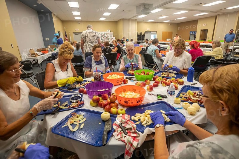 St. Clair Shores, Michigan, Volunteers at the St. Clair Shores Senior Center make apple pies during their annual Apple Pie Week. They make about 900 pies, which are sold to raise funds for the Center's meal program