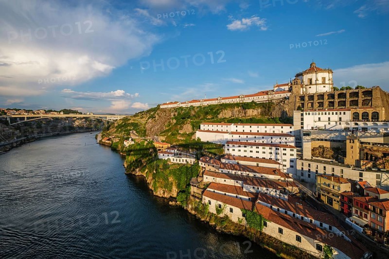 View of Vila Nova de Gaia city with Mosteiro da Serra do Pilar monastery and Douro river on sunset. Porto, Vila Nova de Gaia, Portugal, Europe