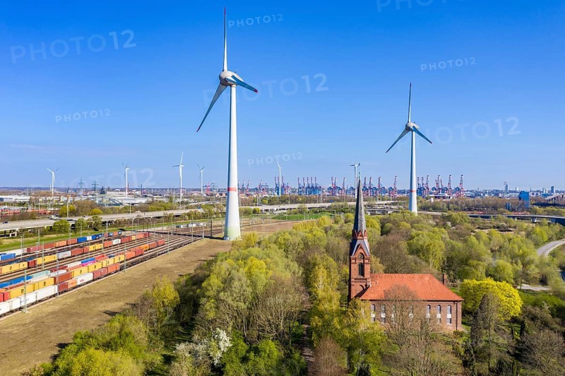 St. Gertrude's Church, only remaining building of former village Hamburg Altenwerder, now industrial harbor area, railway yard, highway A7, wind mill, Altenwerder, Hamburg Germany