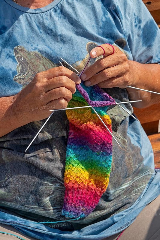 Woman knitting, colourful jumper, detail, Wustrow, Darß, Mecklenburg-Vorpommern, Germany, Europe