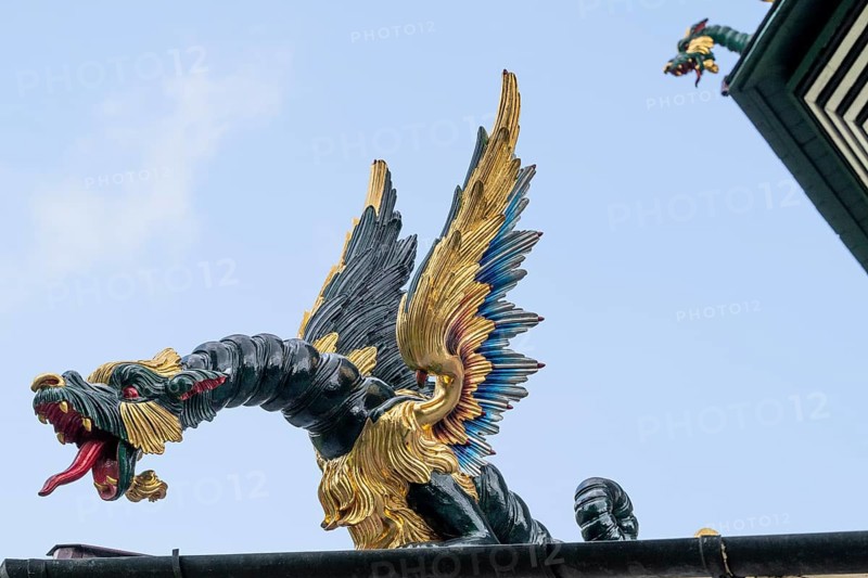 Close-up of a gold-blue-red painted dragon statue, historic large pagoda, Royal Botanic Gardens (Kew Gardens), UNESCO World Heritage Site, Kew, Greater London, England, Great Britain