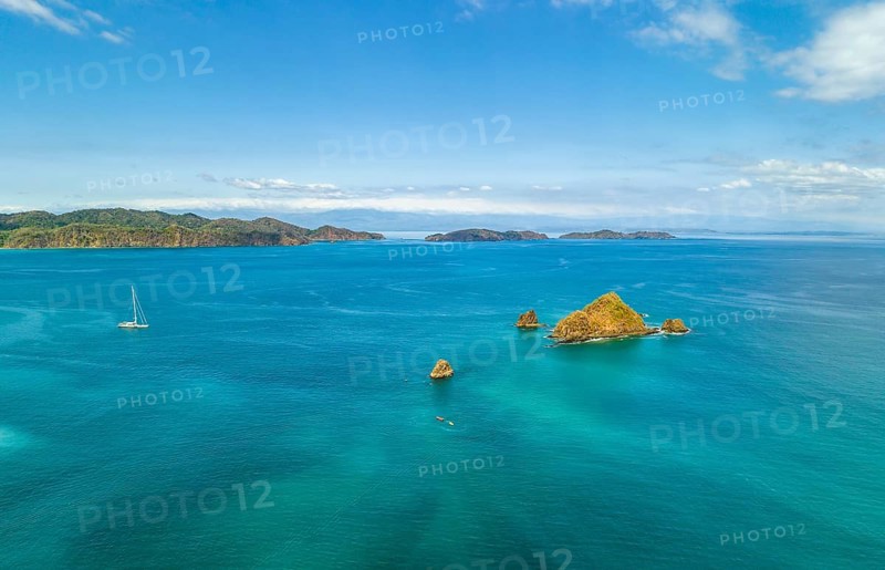 Aerial view, tropical islands and sailing boat in the turquoise ocean, Tortuga Island, Puntarenas, Costa Rica, Central America