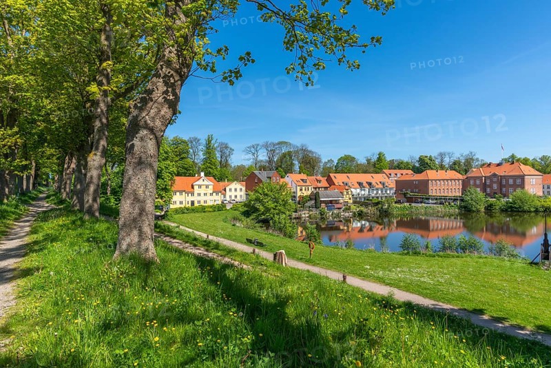 Old town of Nyborg, moat around the medieval town, houses at the castle wall, water reflection, Fyn, Fyn Island, Denmark, Europe