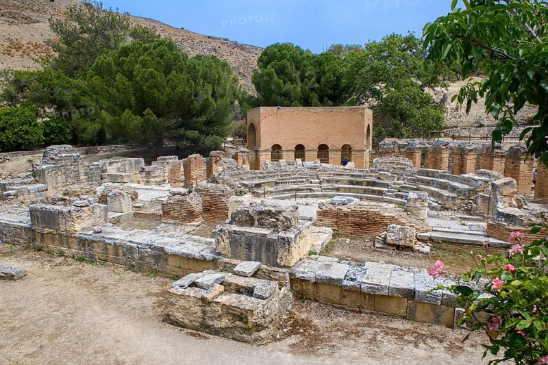 Overview of ruins of historic Roman amphitheatre from antiquity in excavation site remains of ancient Roman city of Gortys Gortyn former capital of Crete, Gortyna, Crete, Greece, Europe