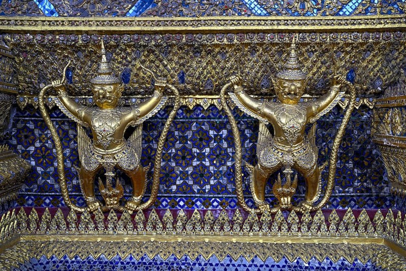 Golden sculptures of Garuda and Naga, Wat Phra Kaew, Temple of the Emerald Buddha, Bangkok, Thailand, Asia