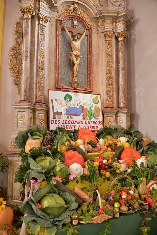 Vegetable offerings at the altar in the Church of St. Epvre during the "Fête de la choucroute" Sauerkraut Festival, Krautergersheim, Département Bas-Rhin, Alsace, France, Europe