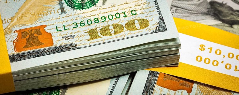 Creative business finance making money concept, letterbox panoramic image of new 100 US dollars 2013 edition banknotes (bills) bundles close up