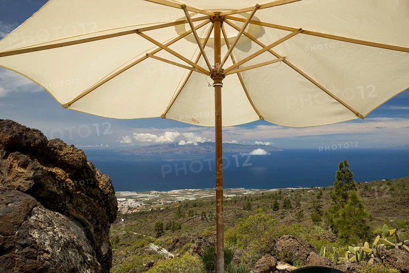 Panorama from Mirador de Chirche over Guia de Isora and Playa de San Juan to the west coast, with the island of Gomera in the background, Tenerife, Canary Islands, Spain, Europe