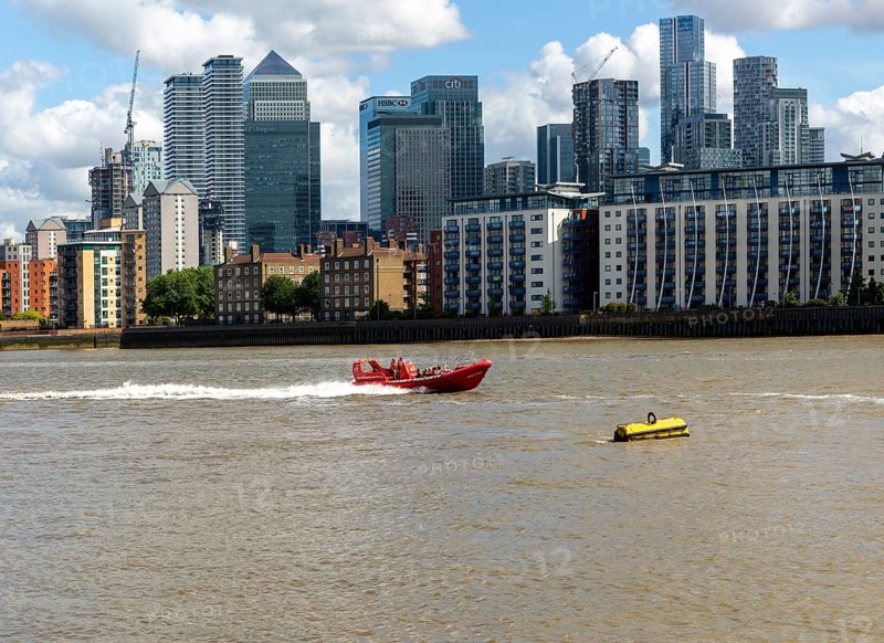 Thames Rockets speedboat adventure rigid inflatable jet boat, Canary Wharf, River Thames, London, England, UK