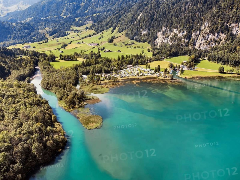 The Vorauen campsite on Lake Klöntal with the Chlü tributary, Klöntal, Canton Glarus, Switzerland, Europe