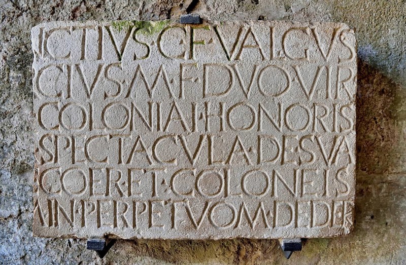 Roman inscription at the entrance to the amphitheater, ancient city of Pompeii, Campania, Italy, Europe