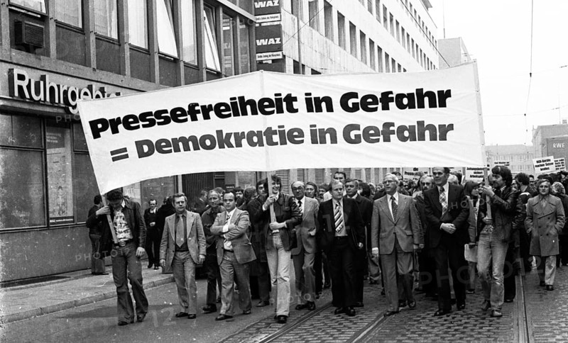 Several hundred journalists and employees of the publishing houses of the newspapers WAZ (Westdeutsche Allgemeine Zeitung) and NRZ (Neue Ruhr-Zeitung) took to the streets in Essen on 27 October 1975 in protest against the merger out of concern for their jobs and press freedom, Germany, Europe
