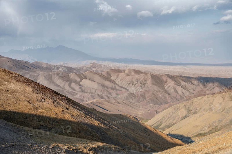 View of mountain landscape at Tyibel Pass, Song Kul Too mountain range, Naryn region, Kyrgyzstan, Asia