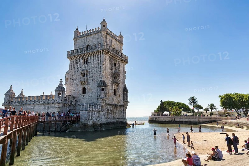Group of tourists in front of Torre de Belem, landmark, Belém, Lisbon, Portugal, Europe