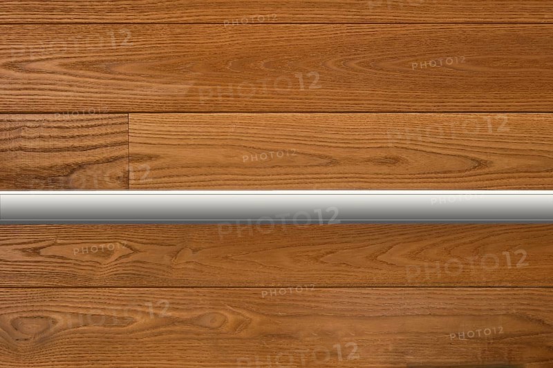 Plastic shelf on wooden wall