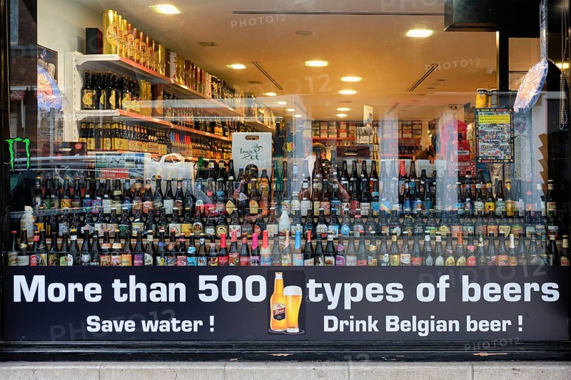 Bruges, Belgium, MAY 29, 2018: Beer shop window in Belgium. Belgium is known for beer production and export, UNESCO inscribed Belgian beer culture on list of intangible cultural heritage of humanity, Europe