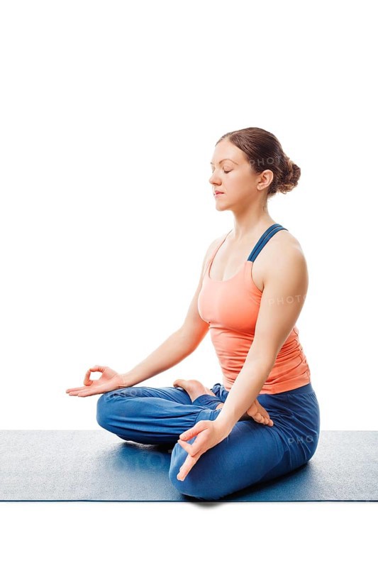 Woman doing Yoga meditation asana Padmasana, lotus pose posture with chin mudra isolated on white background