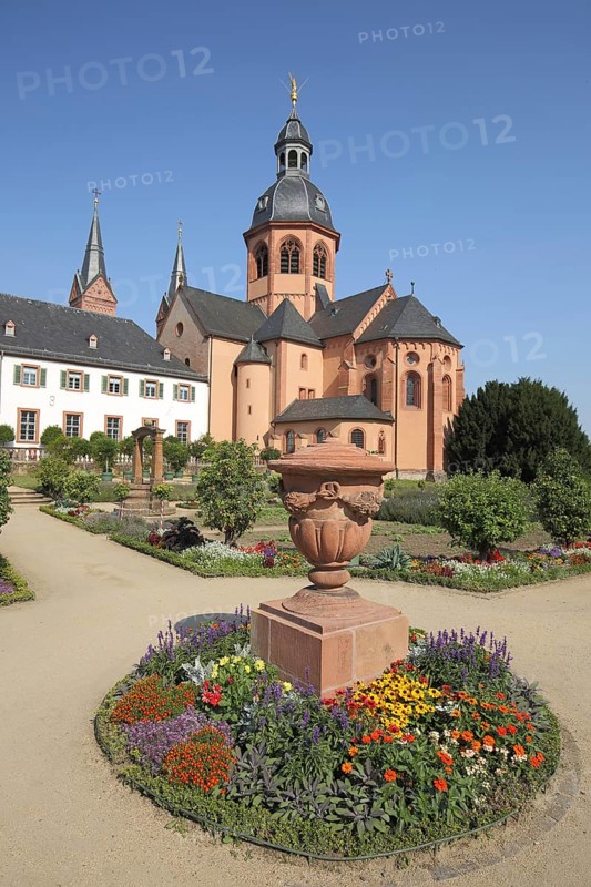 Garden with Einhard Basilica of St. Marcellinus and Peter, monastery complex, Seligenstadt, Main, Hesse, Germany, Europe