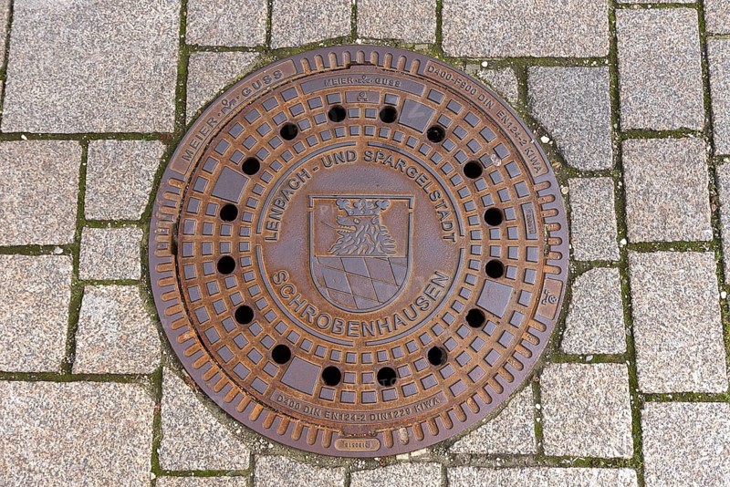 Manhole cover of the town of Schrobenhausen, Upper Bavaria, Germany, Europe