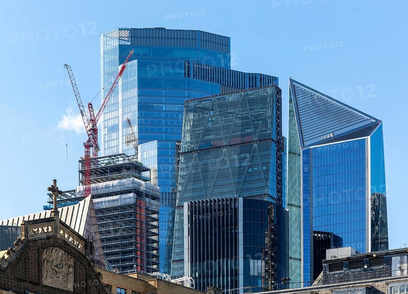 Cranes construction work high rise buildngs in financial district, City of London, England, UK