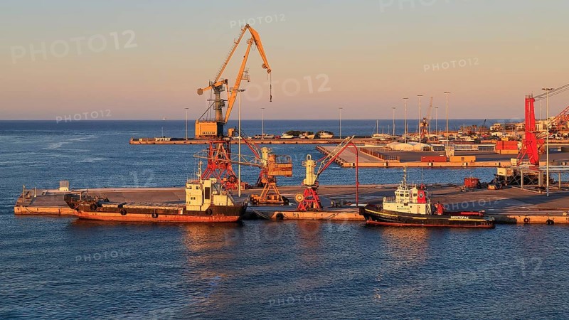 Evening light, pier, loading cranes, tugboats, port, Heraklion, capital, island of Crete, Greece, Europe
